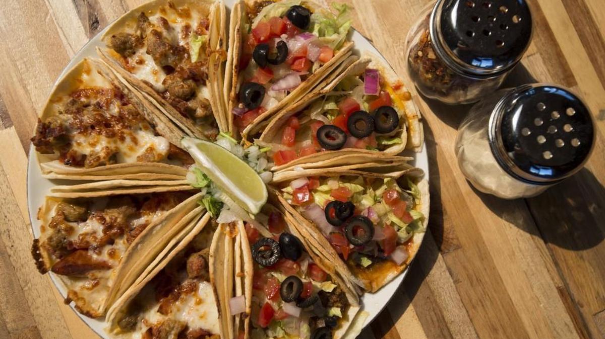 Pizzacos are tacos with pizza fillings found at The Defiant Goldfish next to the Point Defiance Park.
