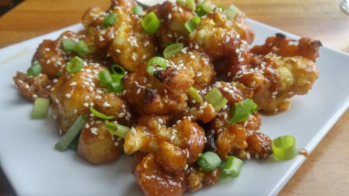 Sesame-ginger wings are served at Viva Tacoma, a restaurant that is entirely vegan with a mix of cooked and raw menu items.
