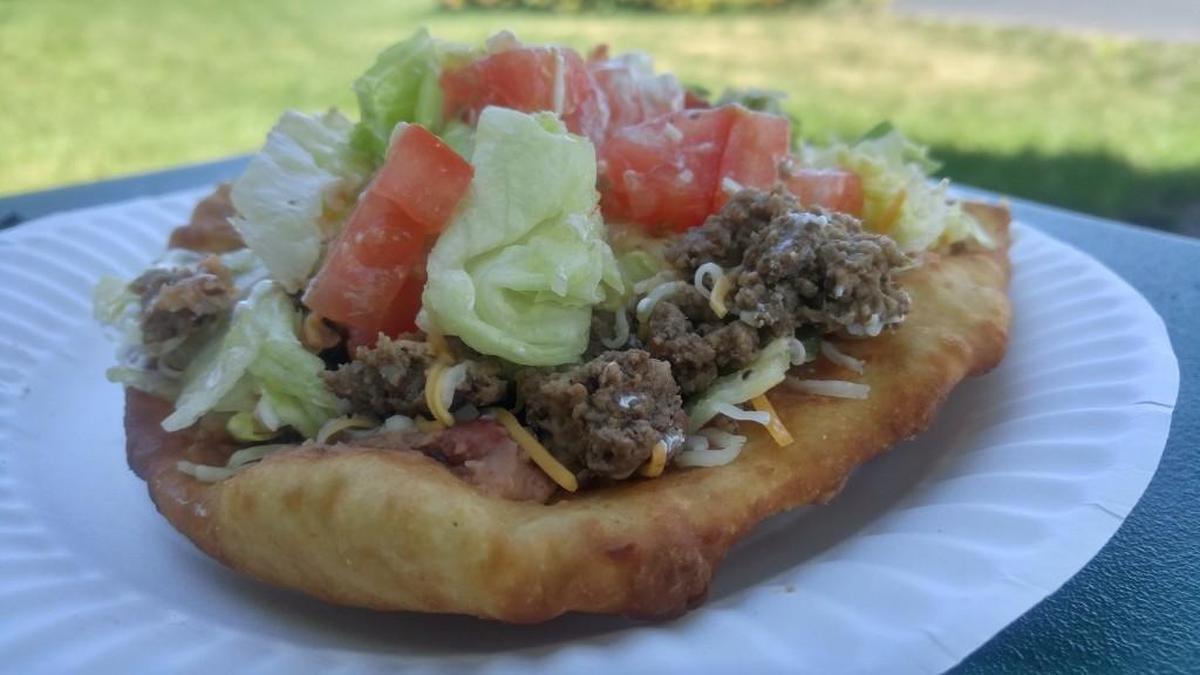Frybread is topped with beans, beef, cheese and vegetables at the Church of the Indian Fellowship.