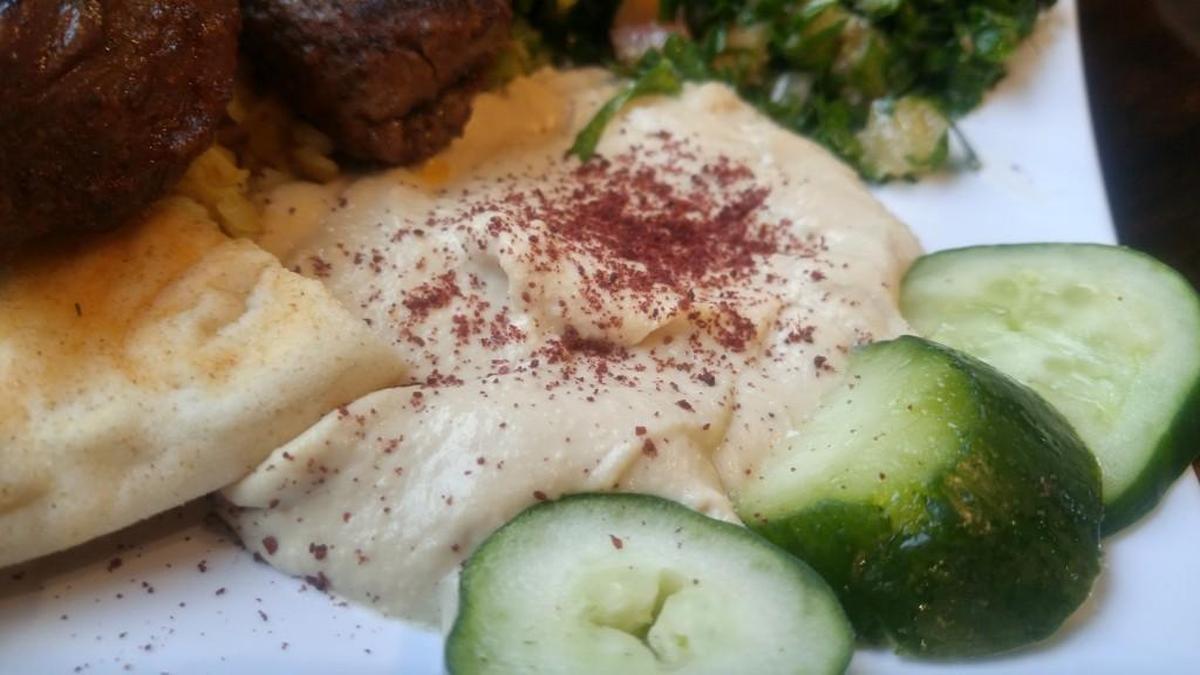 Creamy hummus with cucumbers and pita was included with three of the dinner platters on a first-bite visit of Mediterranean Gyro Grill.