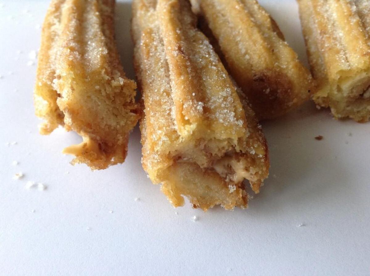 Churros at Plaza Guerrero come with a creamy filling.