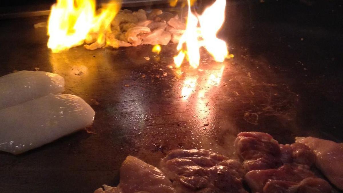 A teppanyaki meal at Samurai’s Japanese Steakhouse typically includes fire, spatula theatrics and a charming chef who cooks a meal right before diners seated at the grill table.