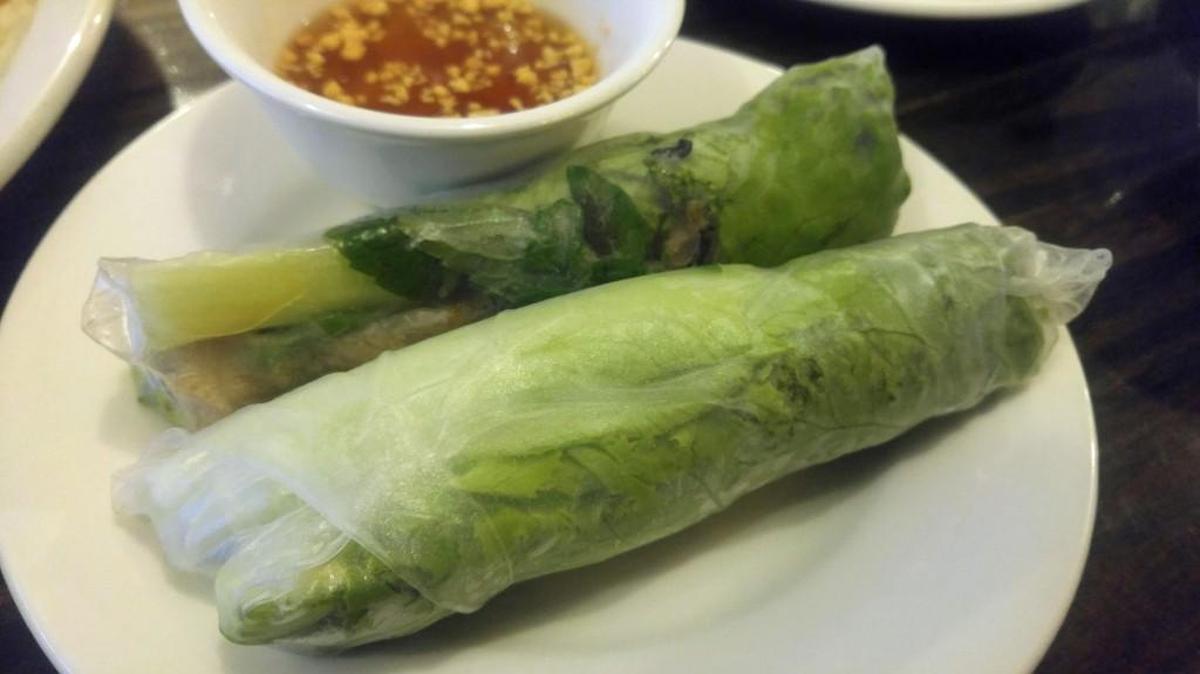 A fresh roll with lettuce and herbs and dipping sauce at La Cà Bar in Tacoma’s Sixth Avenue neighborhood.