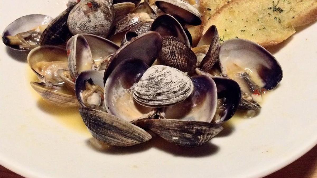 Manilla clams are served with a chardonnay, butter and garlic sauce at WildFin American Grill, which opened Jan. 19 at the Point Ruston development.