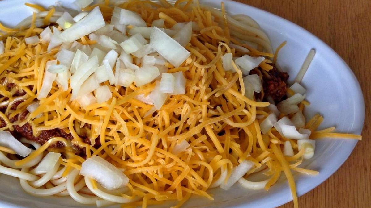 Cincinnati Chili served four-way comes with pasta, sauce, cheddar cheese and diced onions at The Chili Parlor, newly opened in Tacoma.