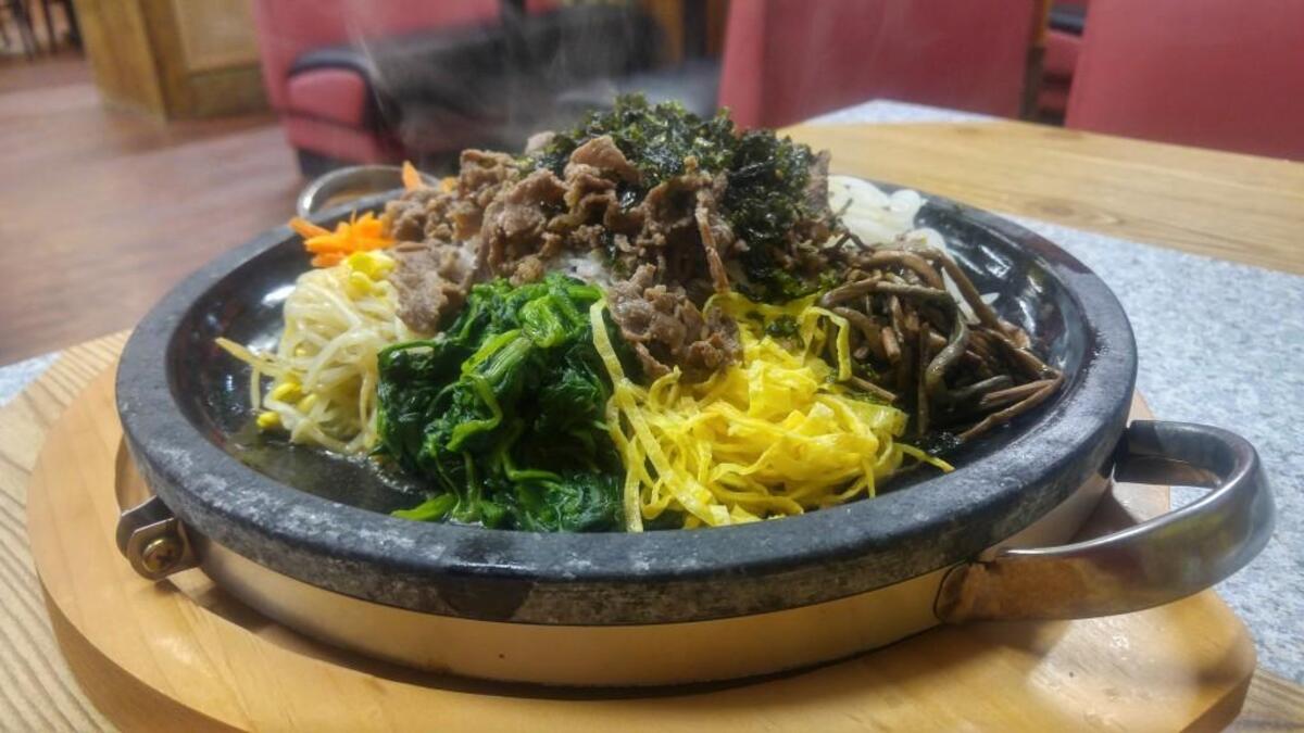 Bibimbap comes with grilled beef, rice and a variety of sauteed vegetables at Sa Rit Gol in Lakewood.