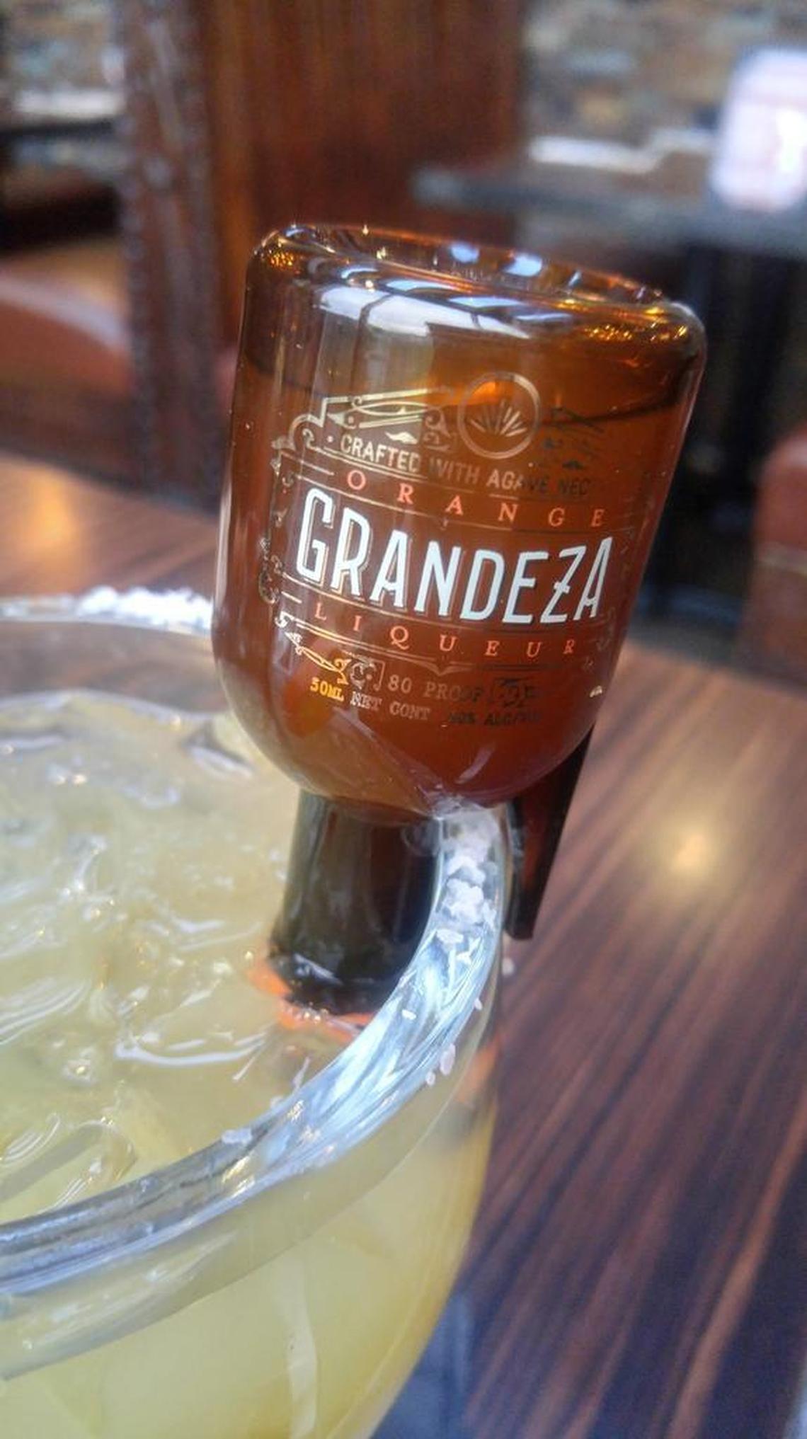 Grandeza is an orange liqueur designed by Moctezuma’s. The bottle dispensing the liqueur into the restaurant’s Cadillac margaritas also was designed by the restaurant’s owners.
