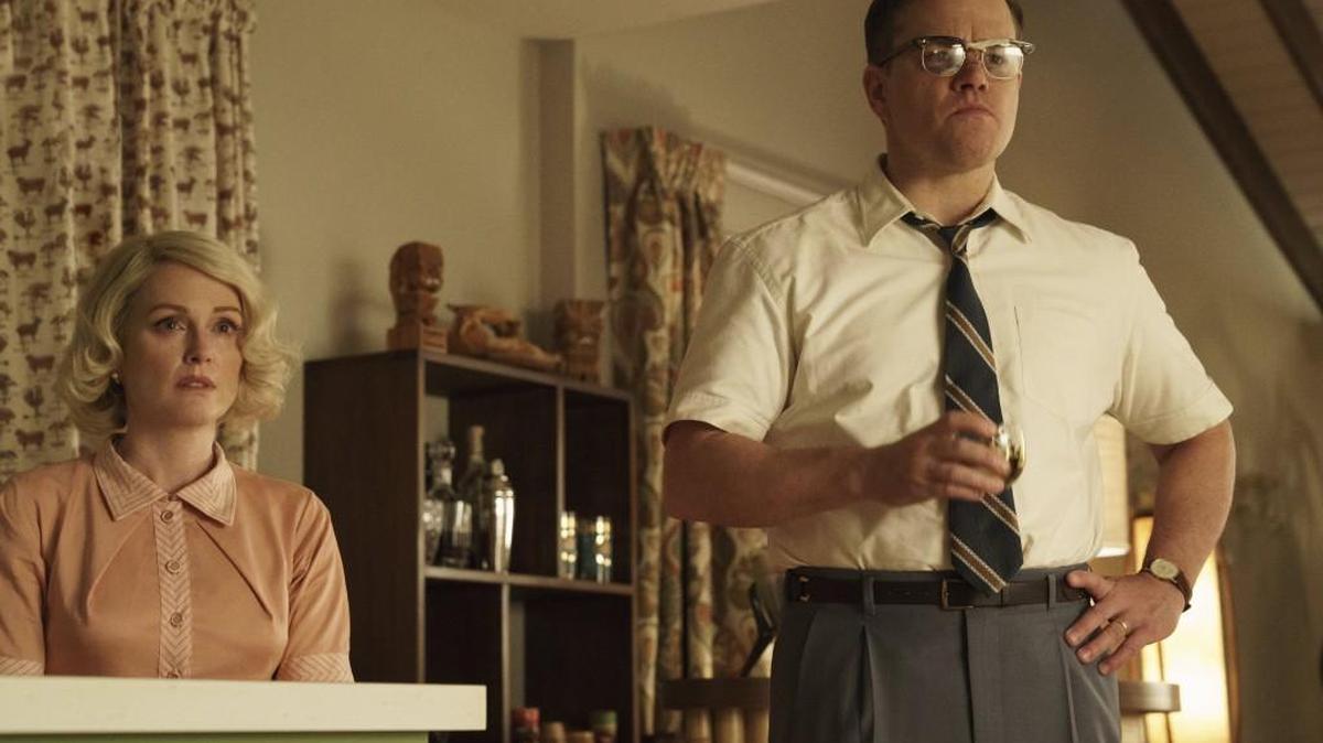 Julianne Moore, left, and Matt Damon are part of what at first seems like a typical 1950’s American family in “Suburbicon.”