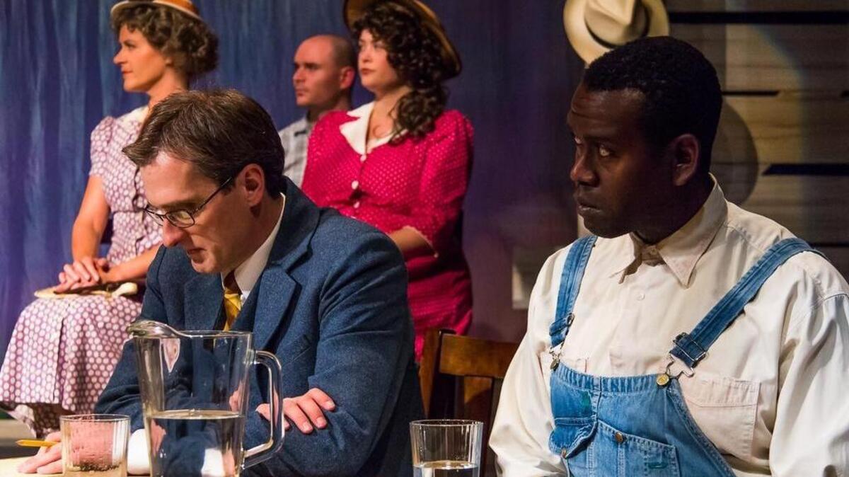 
Aaron Lamb, left, as Atticus Finch, and Robert Humes as Tom Robinson in “To Kill a Mockingbird.”
