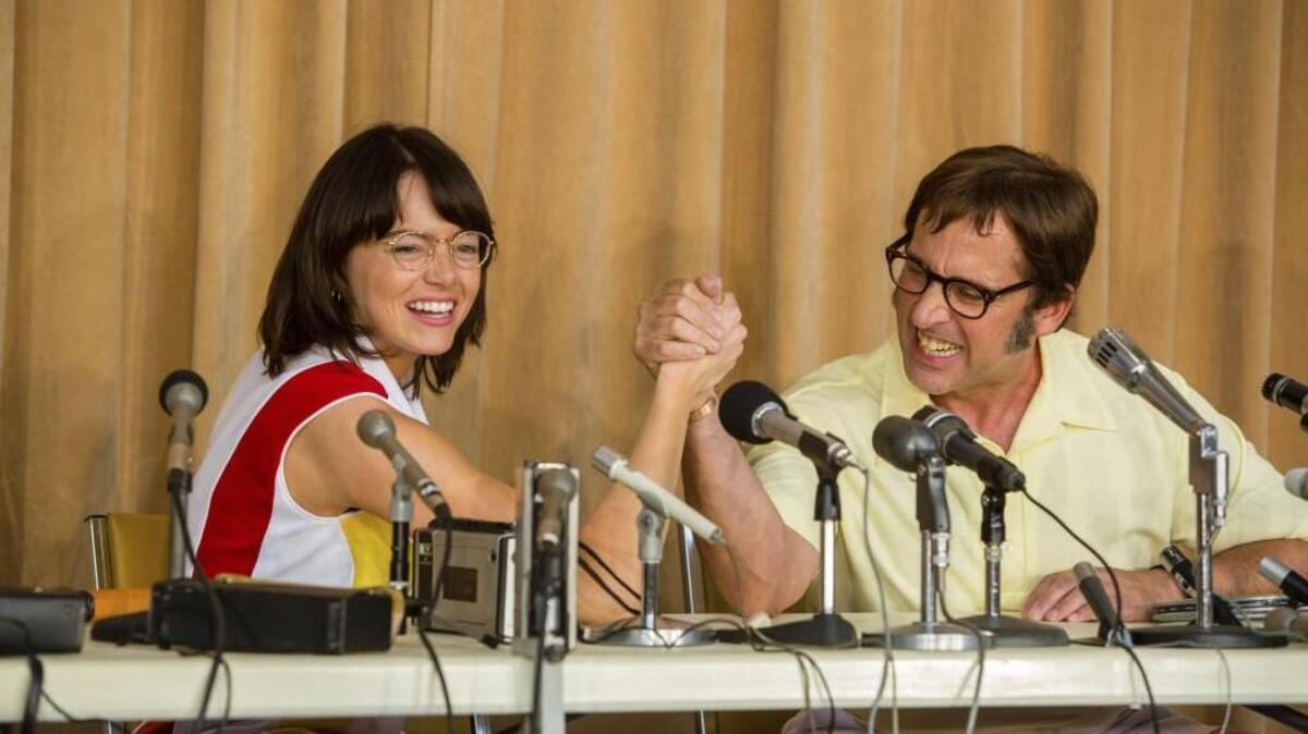 Emma Stone, left, as Billie Jean King, and Steve Carell, as Bobby Riggs, in “Battle of the Sexes.”