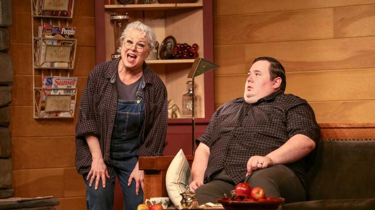 Jen Aylsworth as Betty and Blake R. York as Charlie in “The Foreigner,” presented by Tacoma Little Theatre.