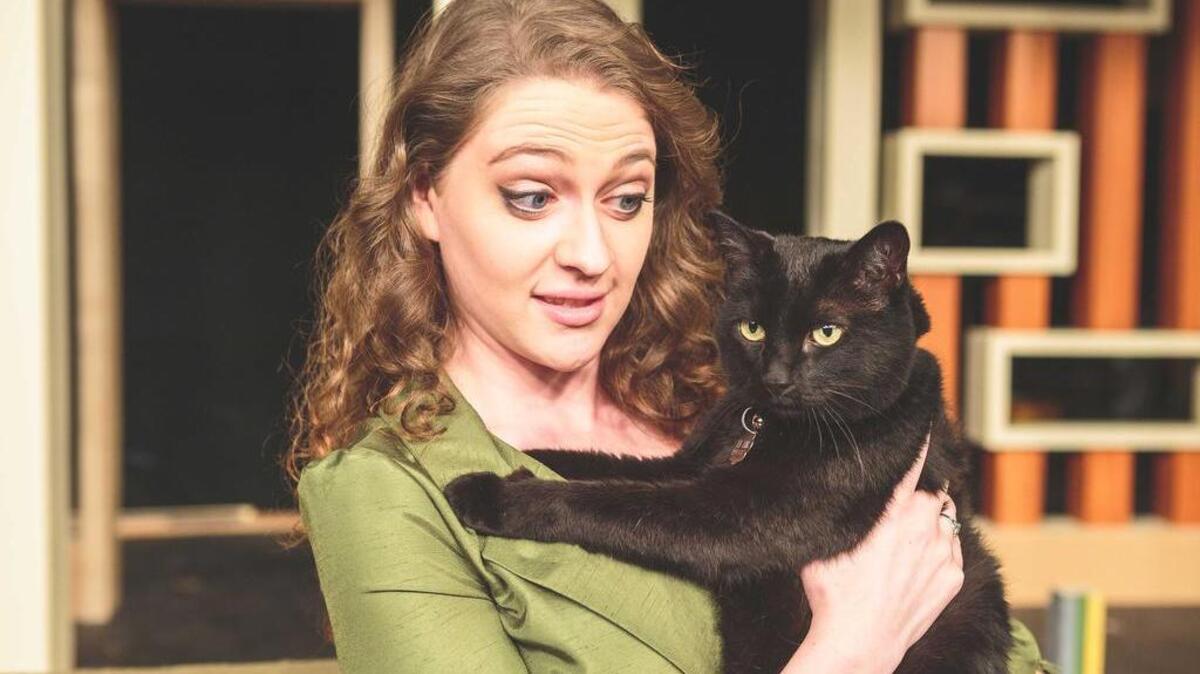 Victoria Ashley portrays the witch Gillian in Tacoma Little Theatre’s presentation of “Bell, Book an Candle.”