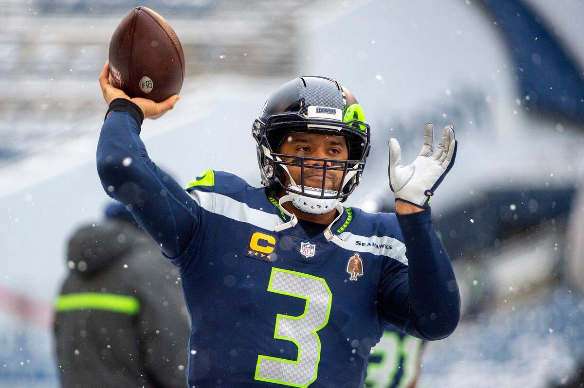 Seattle Seahawks quarterback Russell Wilson (3) warms up prior to the start of an NFL game against the Chicago Bears on Sunday afternoon at Lumen Field in Seattle.