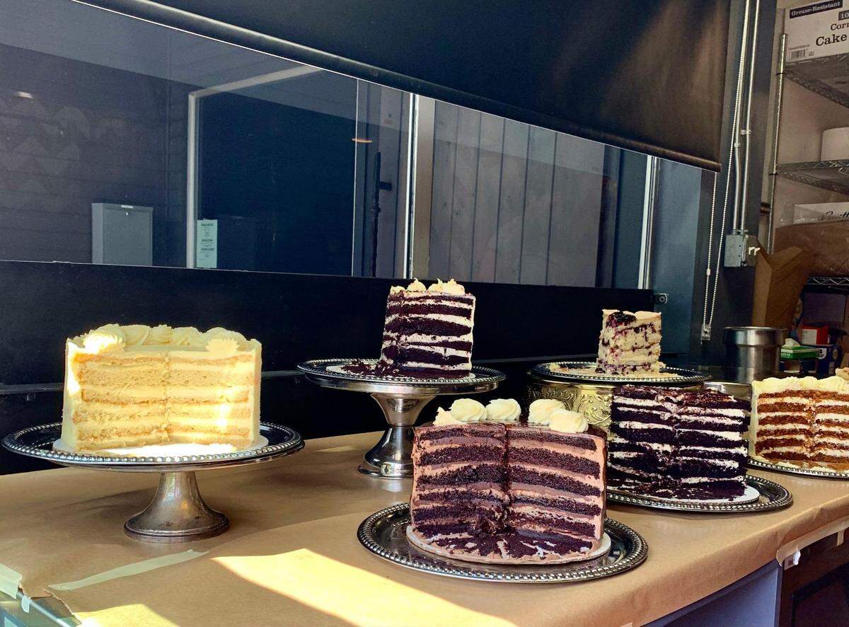 The Cat & Rabbitt Cake Shop serves multi-layered cakes by the slice from a walk-up window at 2811 6th Ave. in Tacoma, Wash., located inside The Pine Room, an events center operated by X Group Catering.