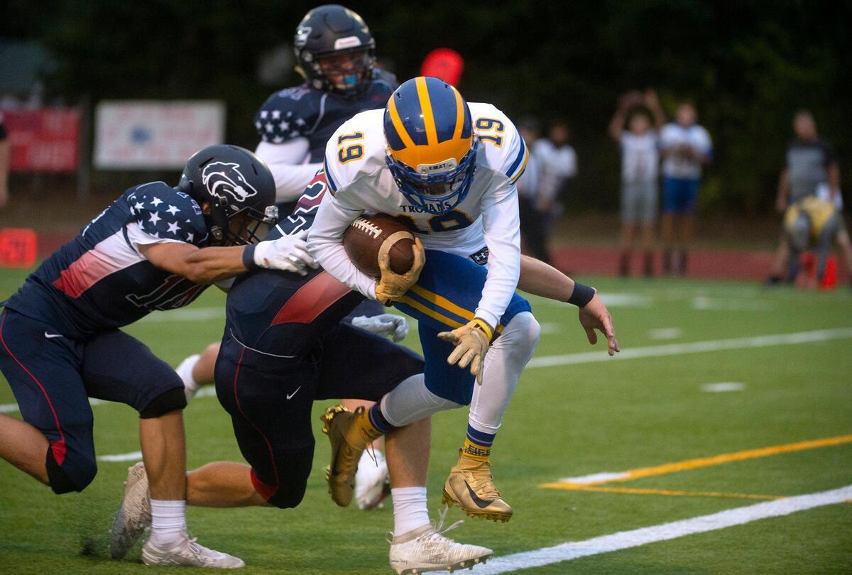 Fife wingback Jay Harper-Brooks leaps into the end zone for a touchdown during Friday night’s football game against Black Hills at Tumwater District Stadium on Sept. 13, 2019.