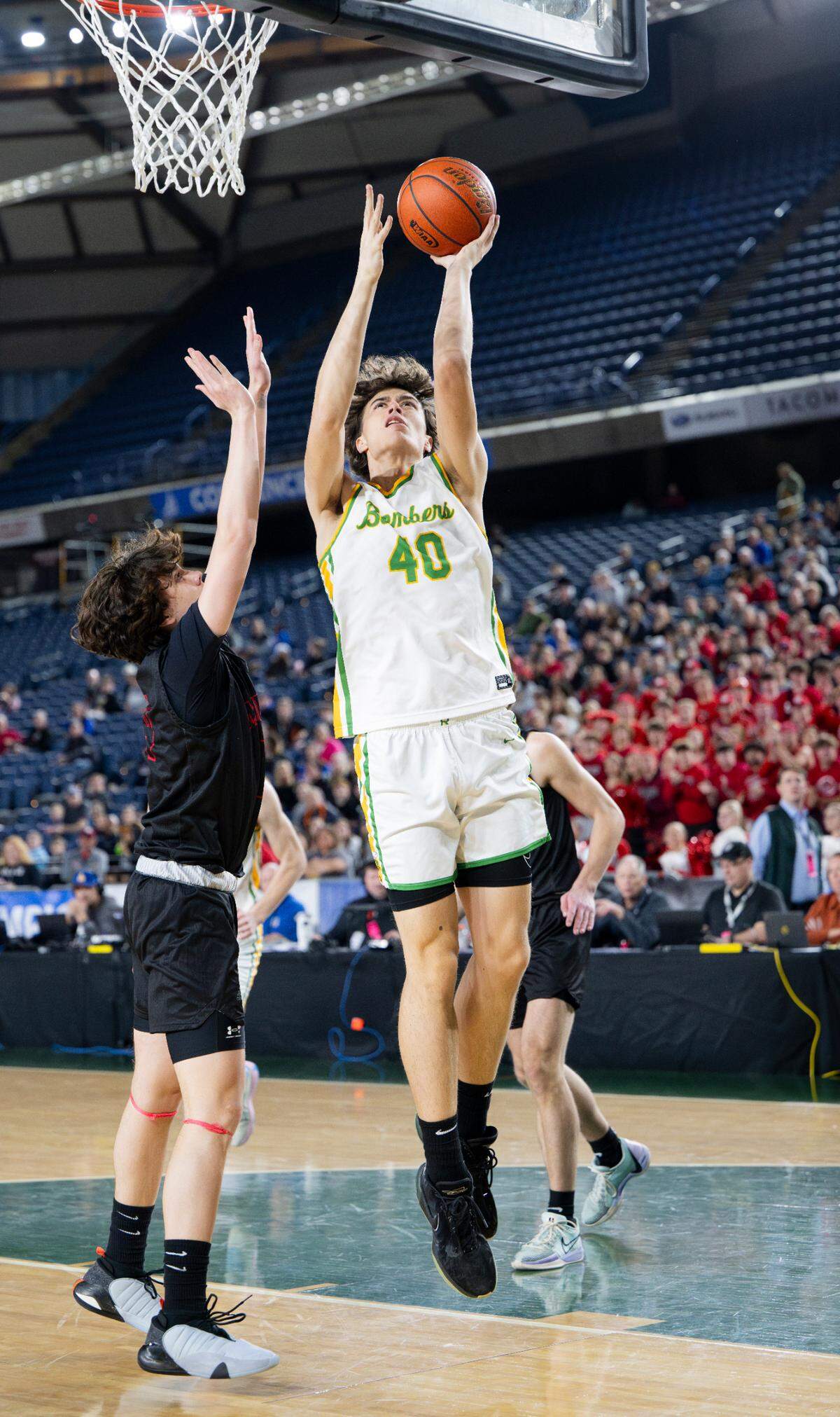 Richland’s Lucas Westerfield (40) shoots over Mount Si’s Marcus Heide (14) during the first half of the Class 4A state championship game at the Tacoma Dome, on Saturday, March 2, 2024, in Tacoma, Wash.