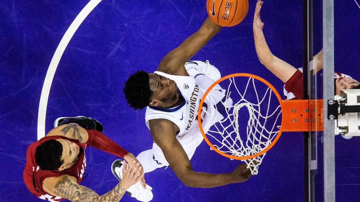 University of Washington forward Noah Dickerson (15) tries to hold on to a rebound in the first half. Washington played Washington State in a NCAA basketball game at Hec Edmundson Pavilion in Seattle, Wash., on Saturday, Jan. 5, 2019.