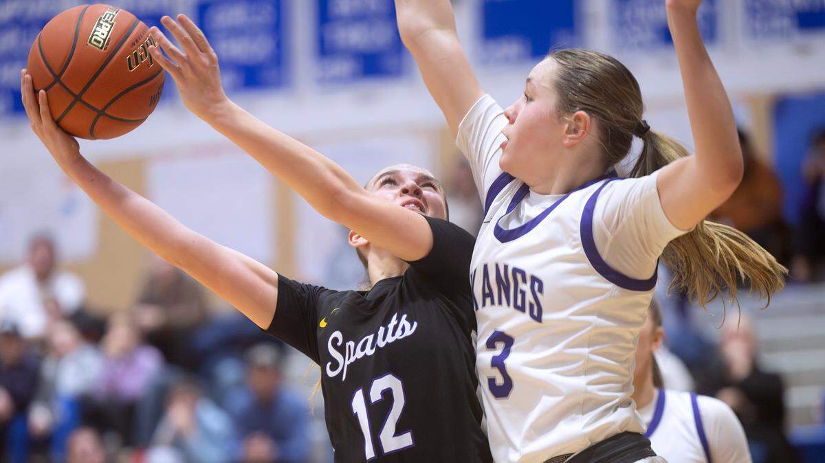 Sumner’s Madison Hughes gets rejected by Lake Washington defender Julia Benthin as the Kangaroos handed the Spartans a 58-47 loss during “The Dream Showcase” MLK basketball tournament at Federal Way High School in Federal Way, Washington, on Monday, Jan. 20, 2025.