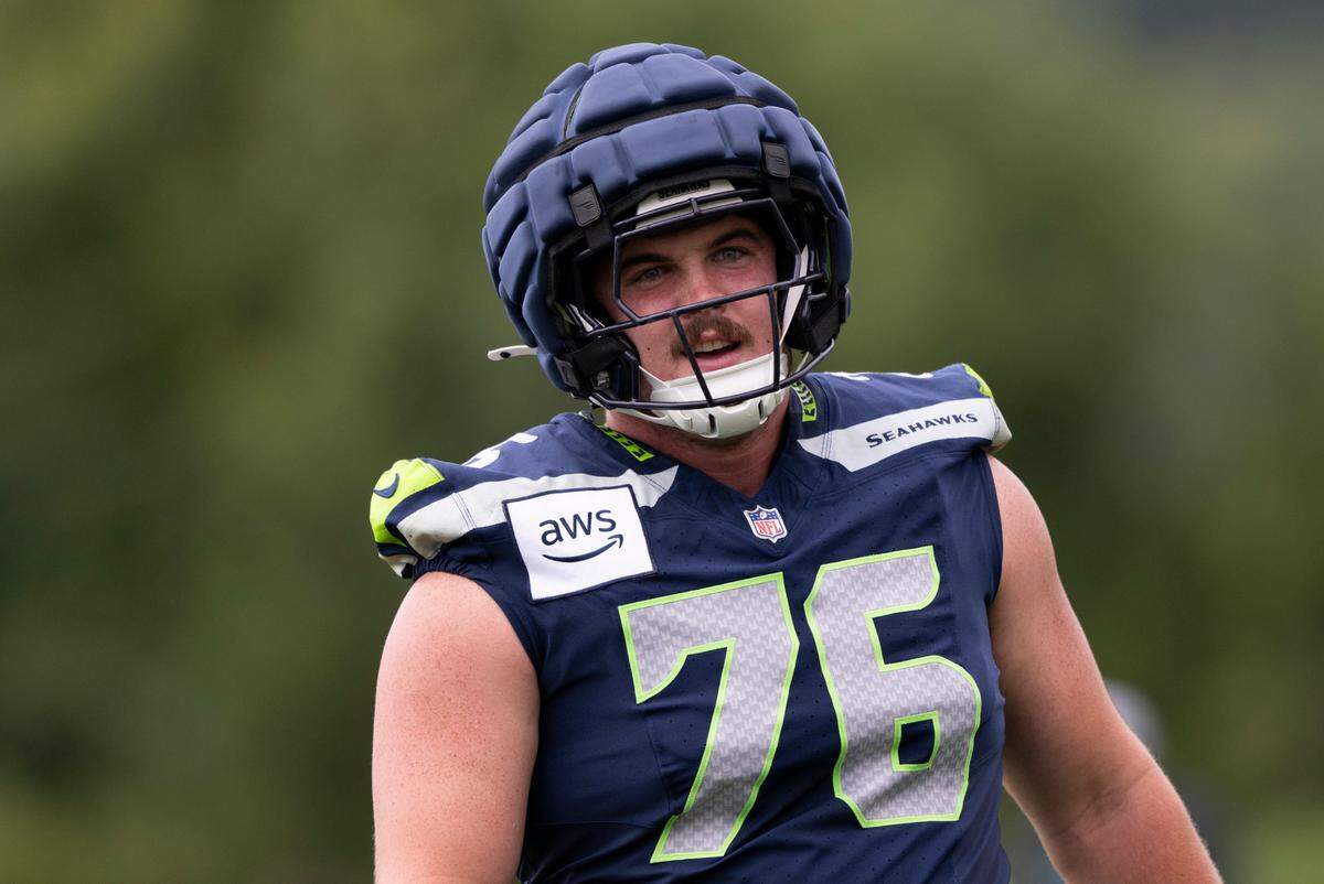 Seattle Seahawks guard Grey Zabel (76) runs drills during training camp at Virginia Mason Athletic Center on Friday, July 25, 2025, in Renton, Wash.