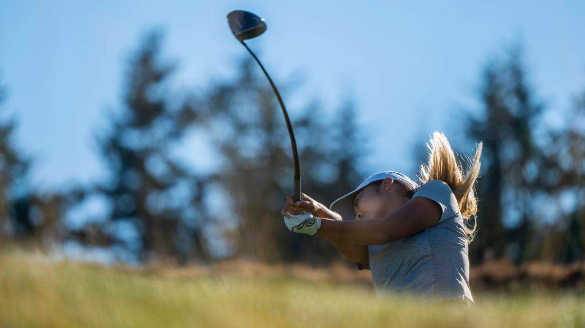 Jennifer Gu from Canada tees the ball while competing in the 122nd U.S. Women’s Amateur Championship at Chambers Bay Golf Course in University Place, Wash. on August 8, 2022.