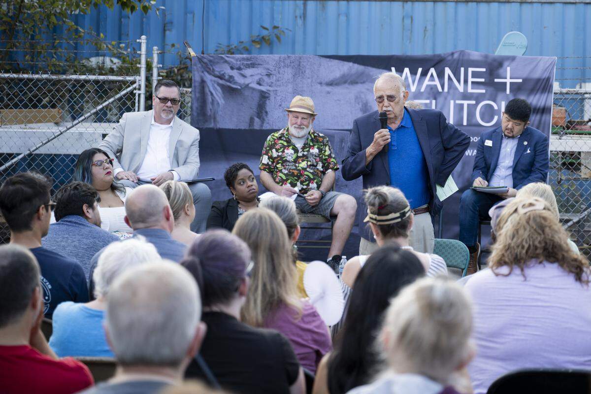 Washington state Sen. Steve Conway speaks to a crowd of concerned citizens during a town hall meeting about the closure of the Fred Meyer at 72nd Street and Pacific Avenue, Thursday, Aug. 28, 2025, in Tacoma, Wash.