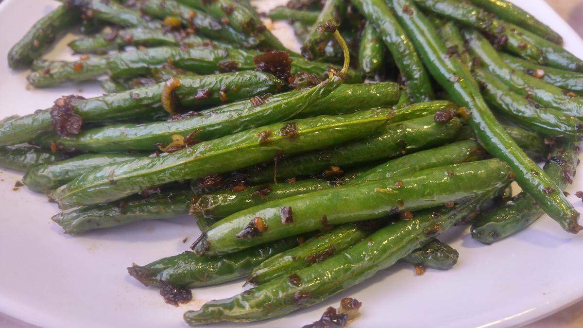 Dry sauteed green beans with lots of garlic from Rose Garden Chinese Restaurant.