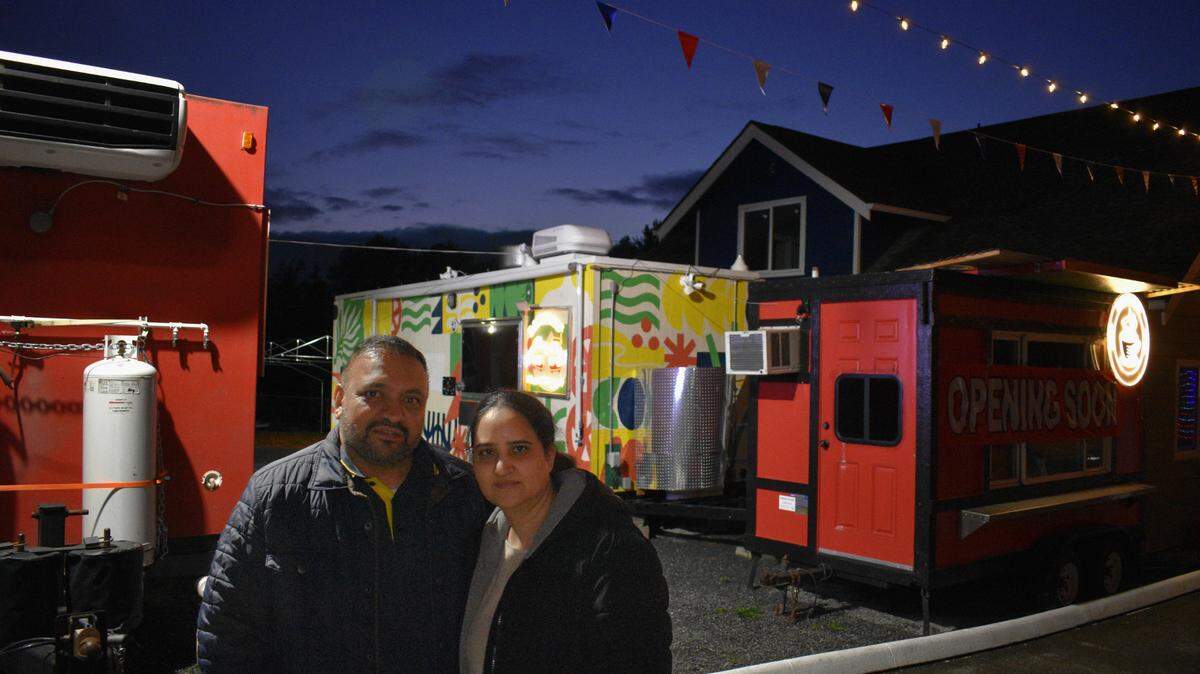 Raj Singh and Rajinder Kaur pose at the site of their new food truck pod, Pind Kohala, at 1824 S. Meridian on May 20, 2025.