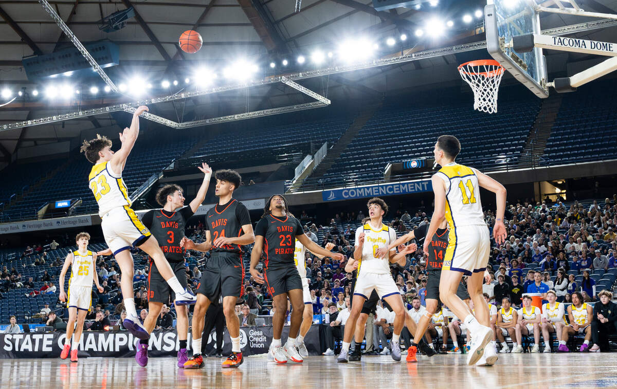 Puyallup’s Drew Jones (23) shoots a fadeaway against Davis during the second half of a Class 4A state basketball tournament first-round game at the Tacoma Dome on Wednesday, March 5, 2025, in Tacoma, Wash.