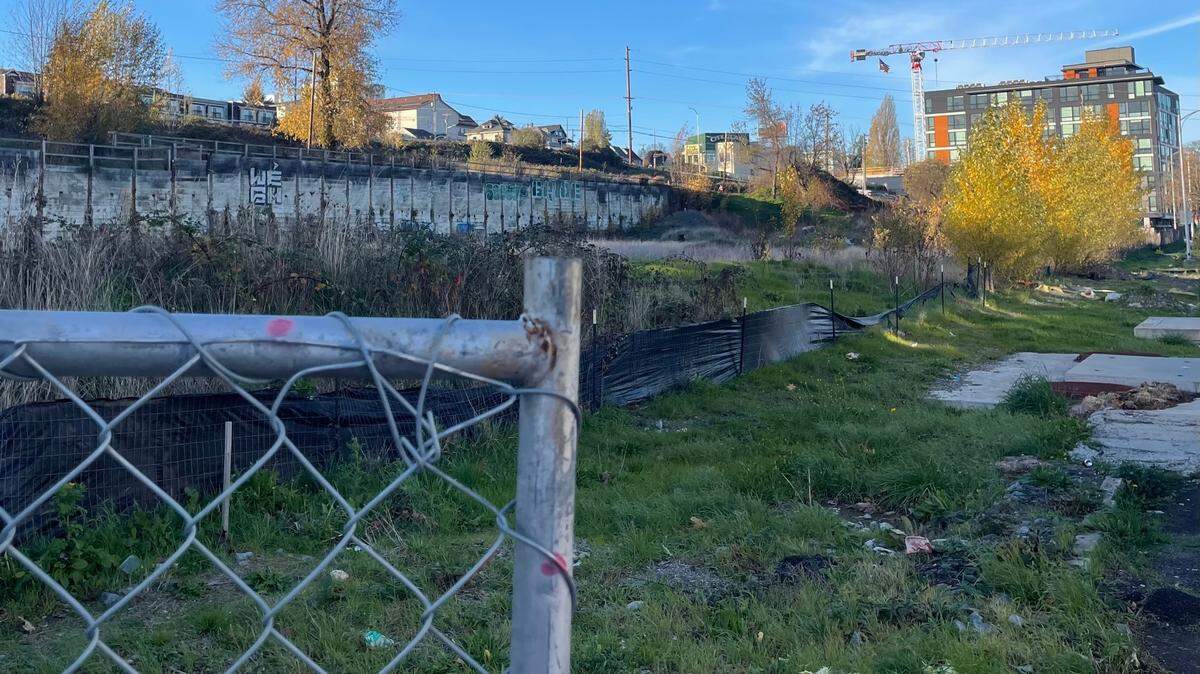 Vacant parcels between Tacoma and Fawcett avenues and South 21st and South 23rd streets as seen Sunday in Tacoma, the future site of Tacoma Town Center buildings 3 through 6. County records show a lien filed Nov. 8 against the development’s vacant parcels by a landscaping company.