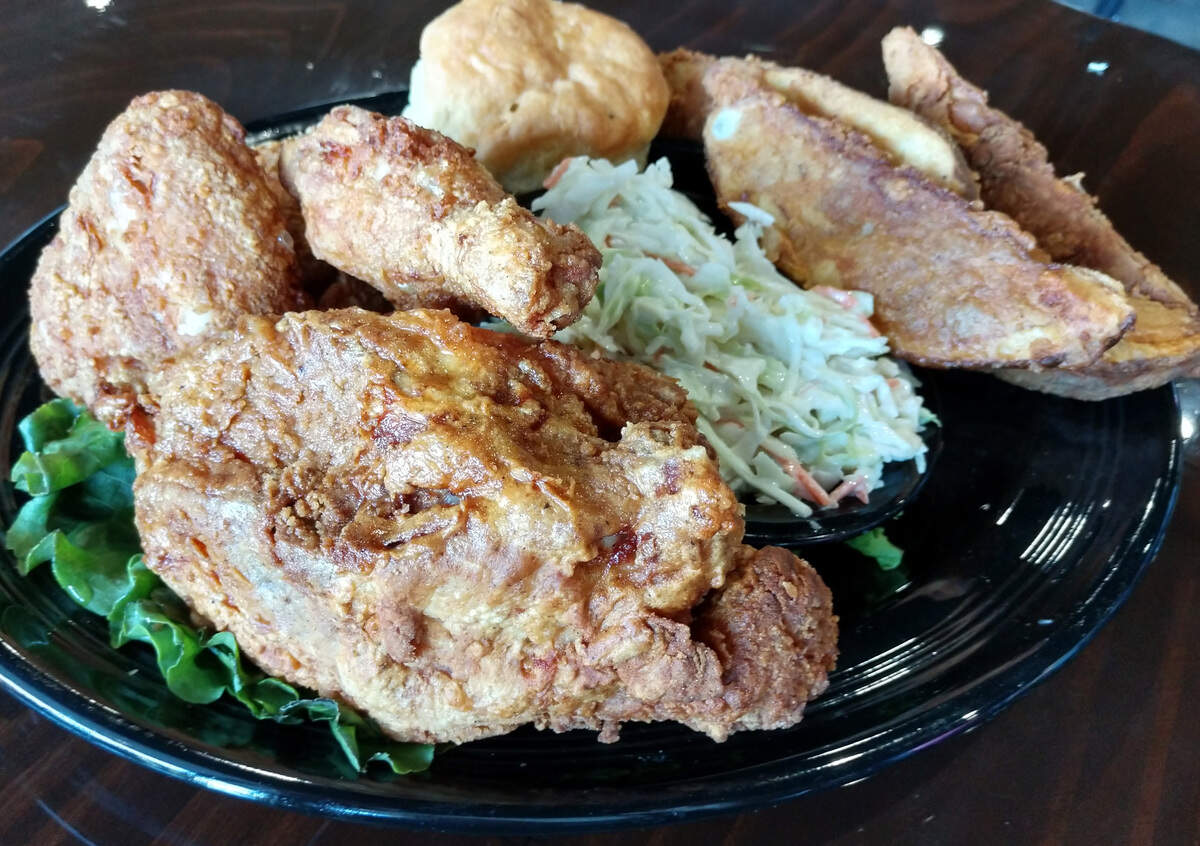 Fried chicken dinner from Summit Pub includes jojo potatoes, a biscuit and coleslaw.