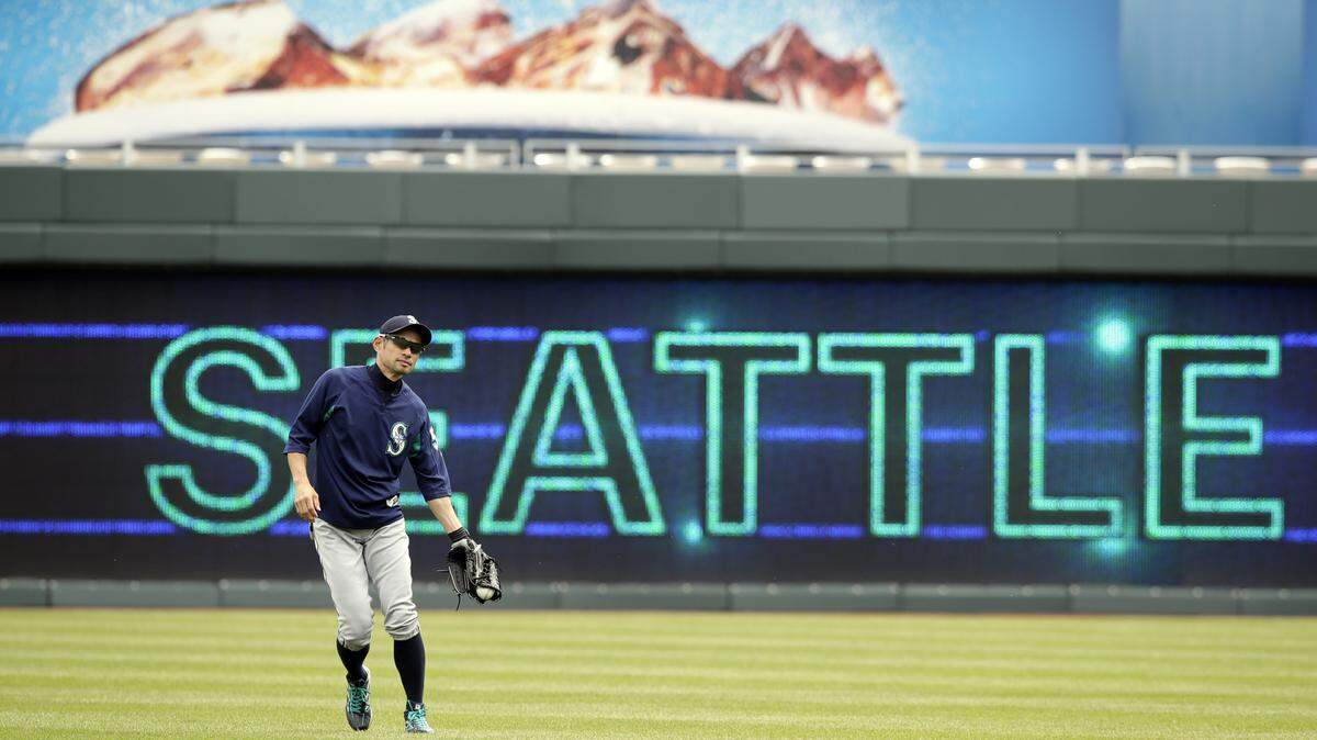 Seattle Mariners right fielder Ichiro Suzuki warms up before a baseball game against the Kansas City Royals at Kauffman Stadium in Kansas City, Mo., Wednesday, April 11, 2018. (AP Photo/Orlin Wagner)