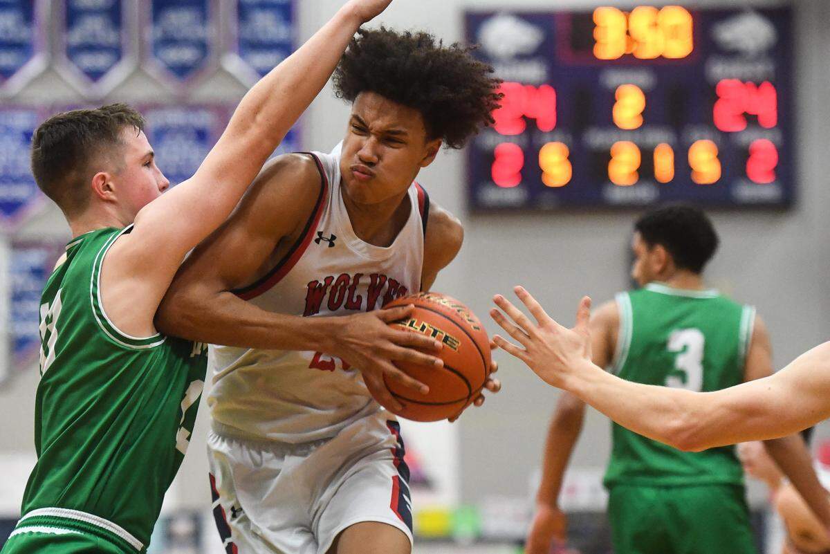 Black Hills’ Justin Hicks drives to the hoop during the second quarter. Black Hills played Tumwater in a basketball game at Black Hills High School in Olympia, Wash., on Friday, Jan. 24, 2020.