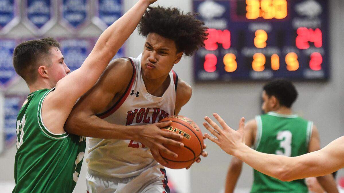 Black Hills’ Justin Hicks drives to the hoop during the second quarter. Black Hills played Tumwater in a basketball game at Black Hills High School in Olympia, Wash., on Friday, Jan. 24, 2020.
