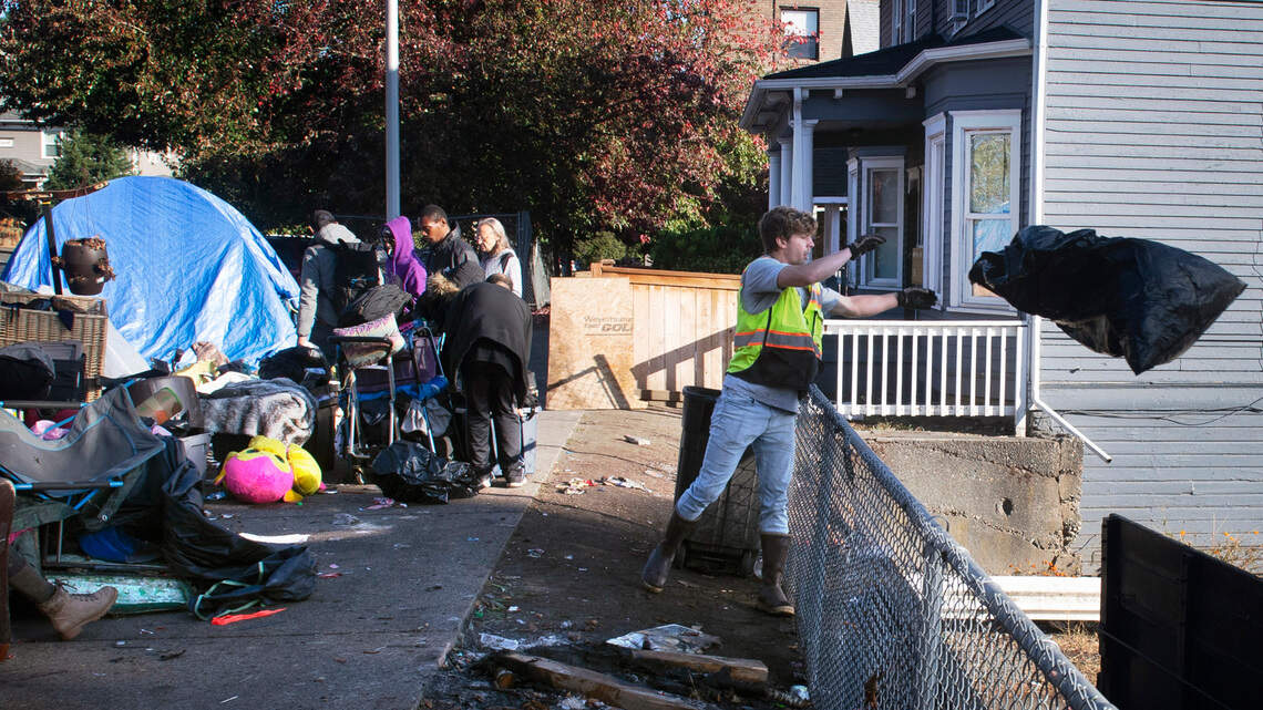 What happens to personal items displaced during Tacoma homeless camp sweeps?