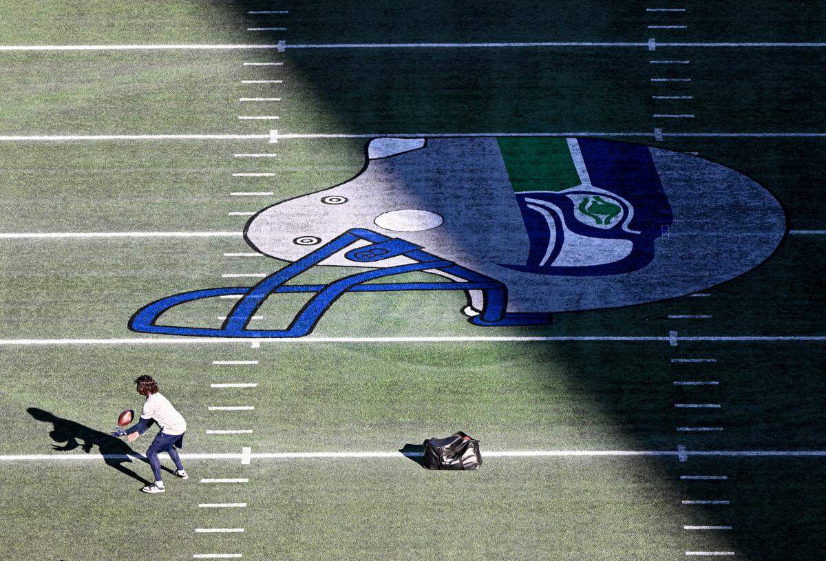 Throwback signage is displayed on the field ahead of the game between the Seattle Seahawks and The Cleveland Browns at Lumen Field, Sunday, Oct. 29, 2023, in Seattle, Wash.