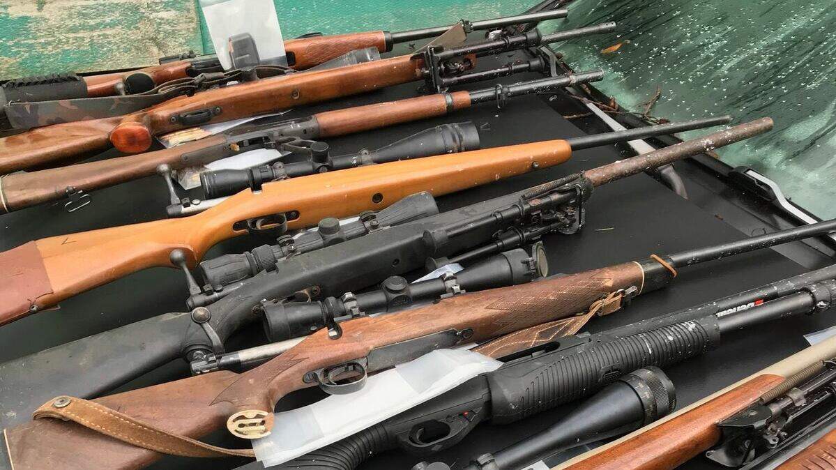 Guns seized during a drug raid in Graham on Jan. 18, 2019.