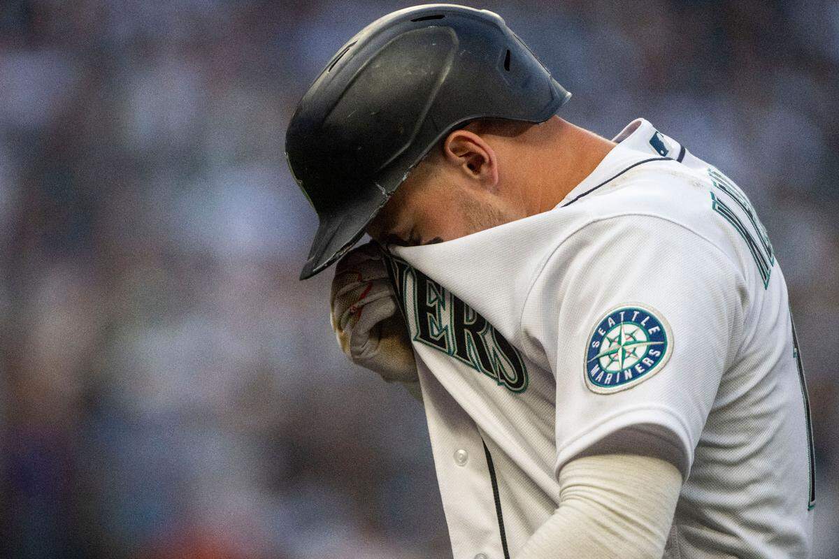 Seattle Mariners left fielder Jarred Kelenic (10) reacts after grounding out to second base in the bottom of the 13th inning of game 3 of the ALDS on Saturday, Oct. 15, 2022, at T-Mobile Park in Seattle.