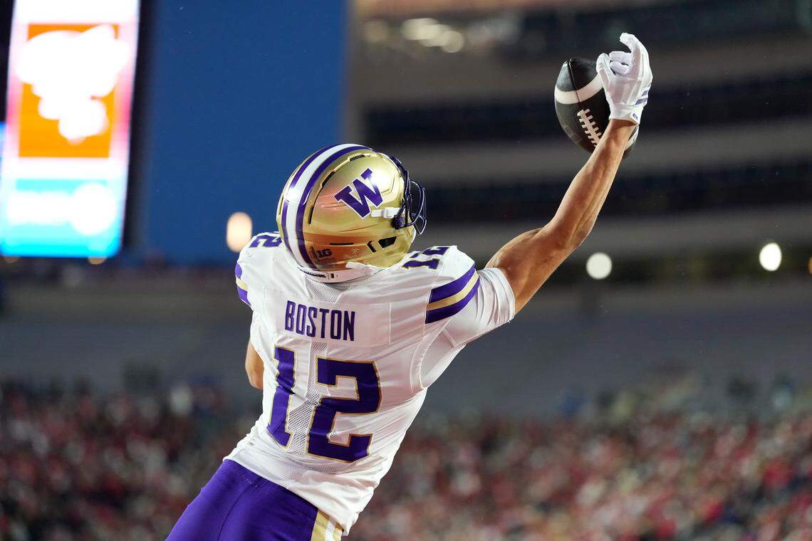 MADISON, WISCONSIN - NOVEMBER 08: Denzel Boston #12 of the Washington Huskies catches a touchdown pass in the second quarter against the Wisconsin Badgers at Camp Randall Stadium on November 08, 2025 in Madison, Wisconsin. (Photo by John Fisher/Getty Images)