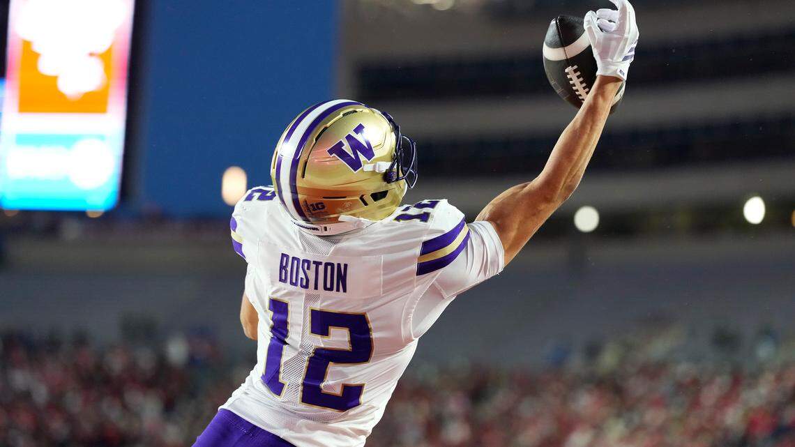 MADISON, WISCONSIN - NOVEMBER 08: Denzel Boston #12 of the Washington Huskies catches a touchdown pass in the second quarter against the Wisconsin Badgers at Camp Randall Stadium on November 08, 2025 in Madison, Wisconsin. (Photo by John Fisher/Getty Images)