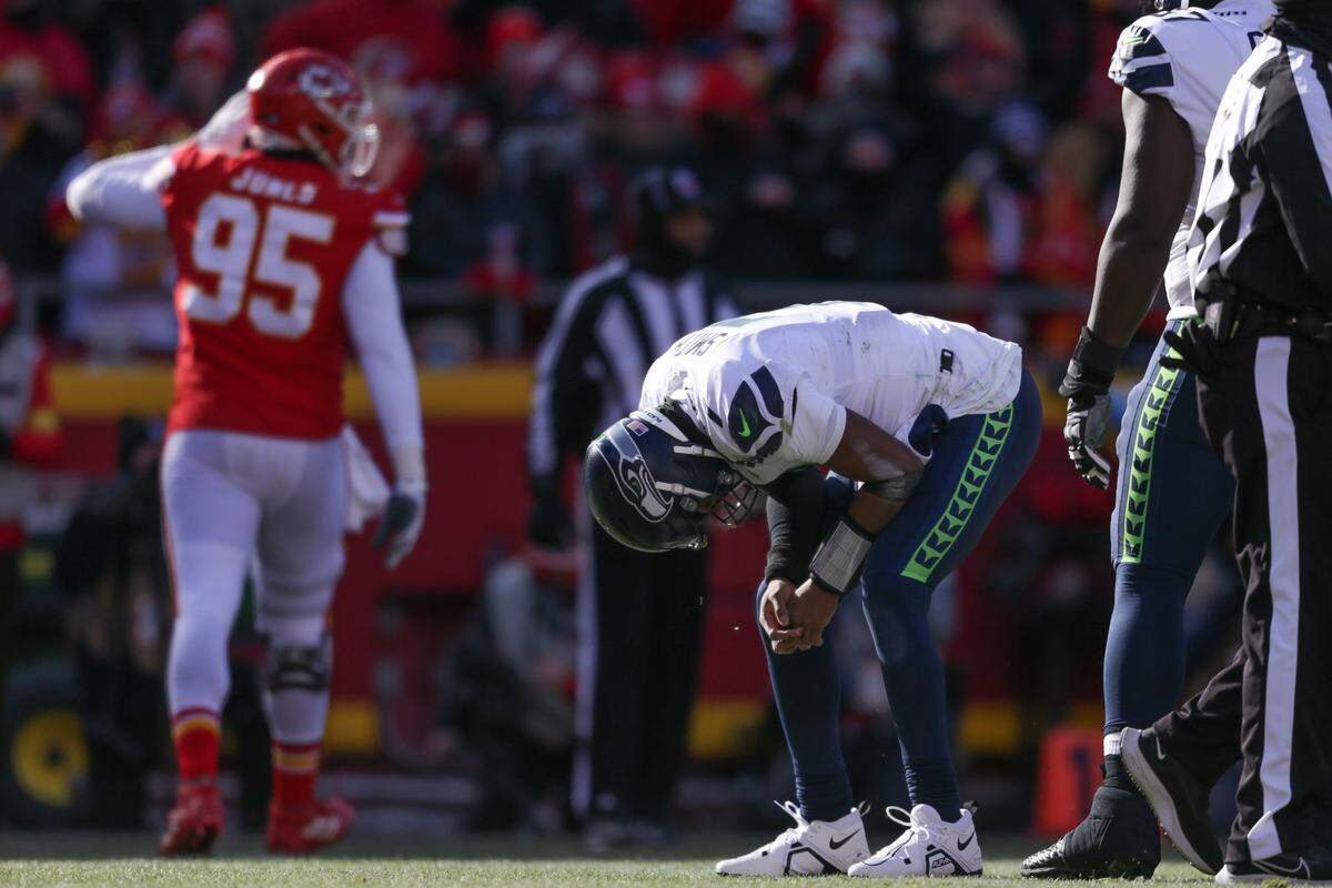 Seattle Seahawks quarterback Geno Smith (7) reacts after he is sacked during the second quarter against the Kansas City Chiefs on Saturday, Dec. 24, 2022, in Kansas City, MO.