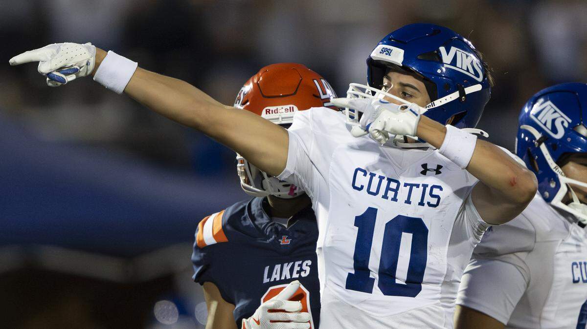 Curtis wide receiver Taylor Smith (10) reacts to a first-down catch against the Lakes Lancers during the first half of the game at Harry Lang Stadium, on Friday, Sept. 19, 2025, in Lakewood, Wash.