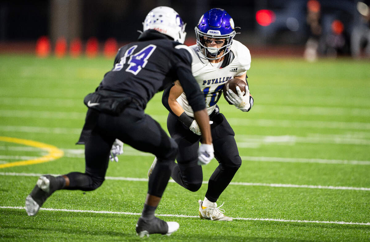 Puyallup’s Jacek Garden (10) stares down Sumner’s Israel Nabors (14) during the first half of the game at Sumner High School, on Thursday, Oct. 3, 2024, in Sumner, Wash.