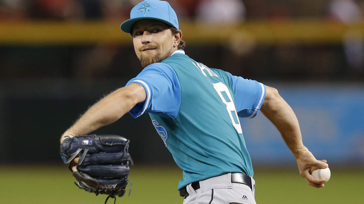Seattle Mariners pitcher Mike Leake throws in the first inning during a baseball game against the Arizona Diamondbacks, Sunday, Aug. 26, 2018, in Phoenix. (AP Photo/Rick Scuteri)
