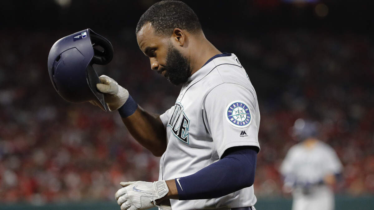 Seattle Mariners’ Denard Span takes off his helmet after he grounded out during the fourth inning of a baseball game against the Los Angeles Angels, Thursday, July 12, 2018, in Anaheim, Calif. (AP Photo/Jae C. Hong)