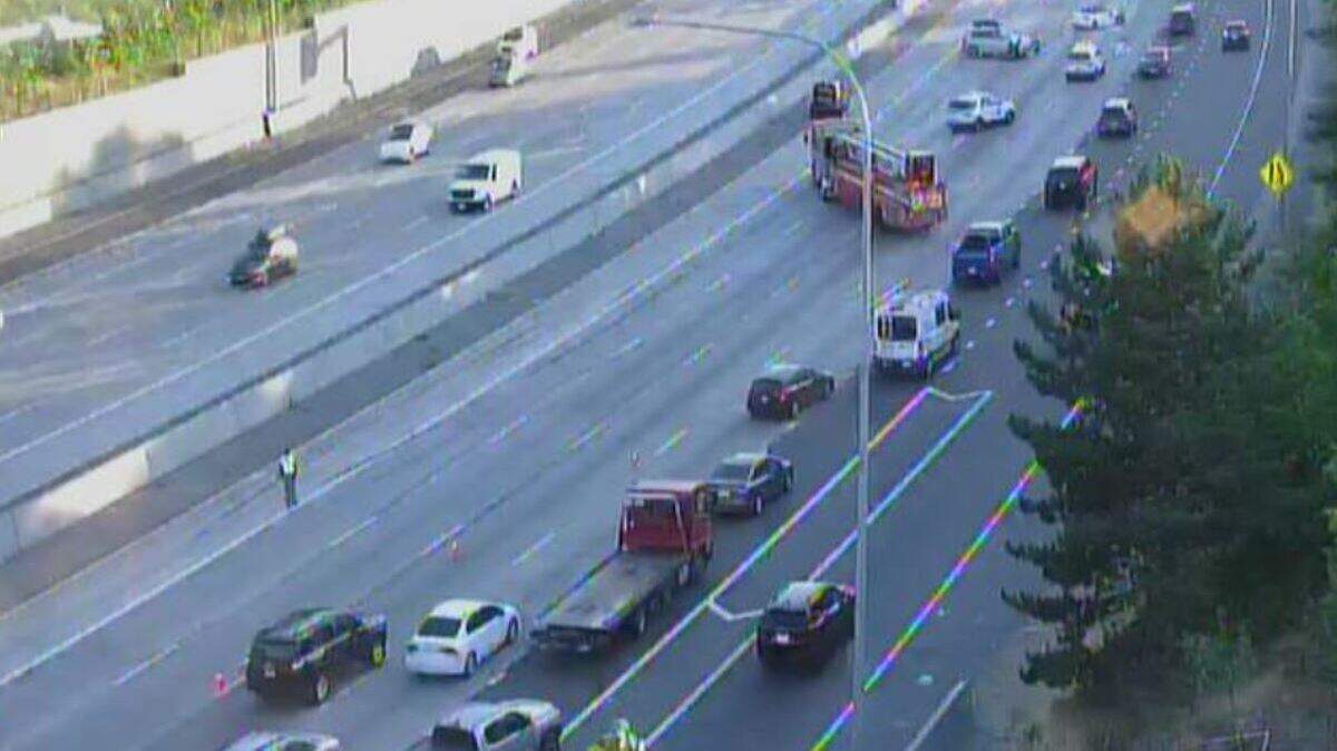 A state Department of Transportation camera shows five lanes of southbound Interstate 5 near the Tacoma Dome blocked Thursday evening.