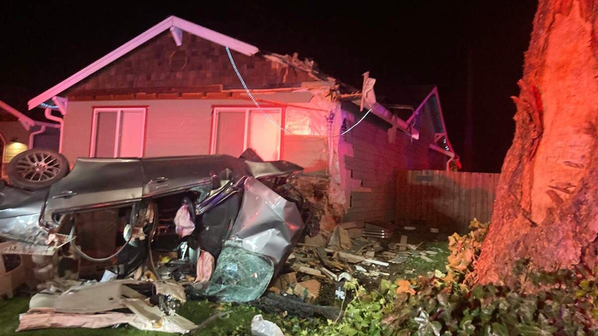 A car hit the roof of a house in Spanaway after it hit a ditch and went airborne early Thursday morning. Detectives are investigating the incident.