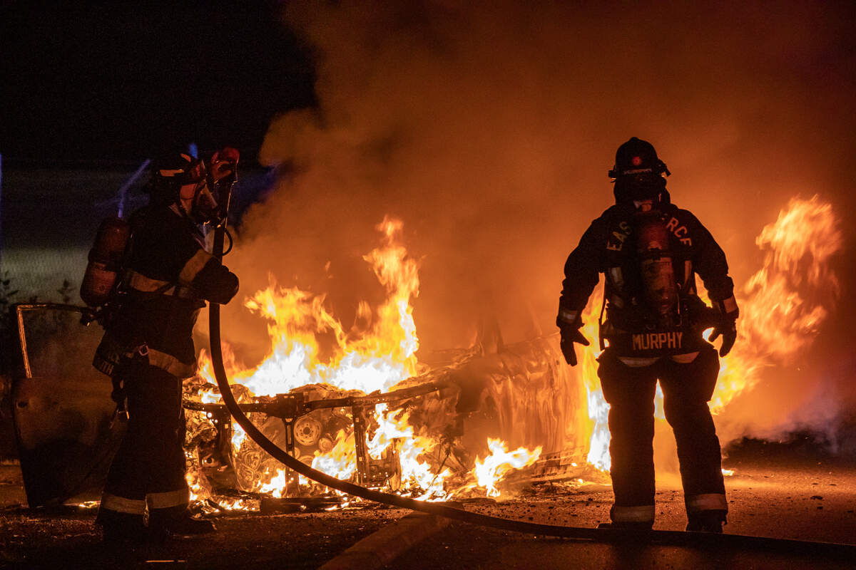 A vehicle reported stolen from Bellevue was found on fire on the side of Pacific Highway in Milton early Wednesday morning. Fife police suspect people in the vehicle shot at and rammed a Honda off the road on Wapato Way, then drove to Milton and intentionally set their vehicle on fire.