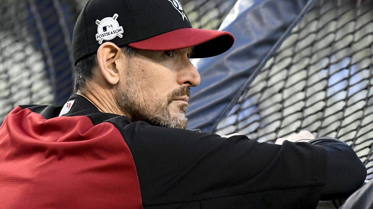 CORRECTS TO TIM LAKER AND NOT TOREY LOVULLO AS ORIGINALLY SENT - Arizona Diamondbacks’ Tim Laker watches batting practice for Game 1 of the baseball team’s National League Division Series against the Los Angeles Dodgers in Los Angeles, Friday, Oct. 6, 2017. (AP Photo/Mark J. Terrill)