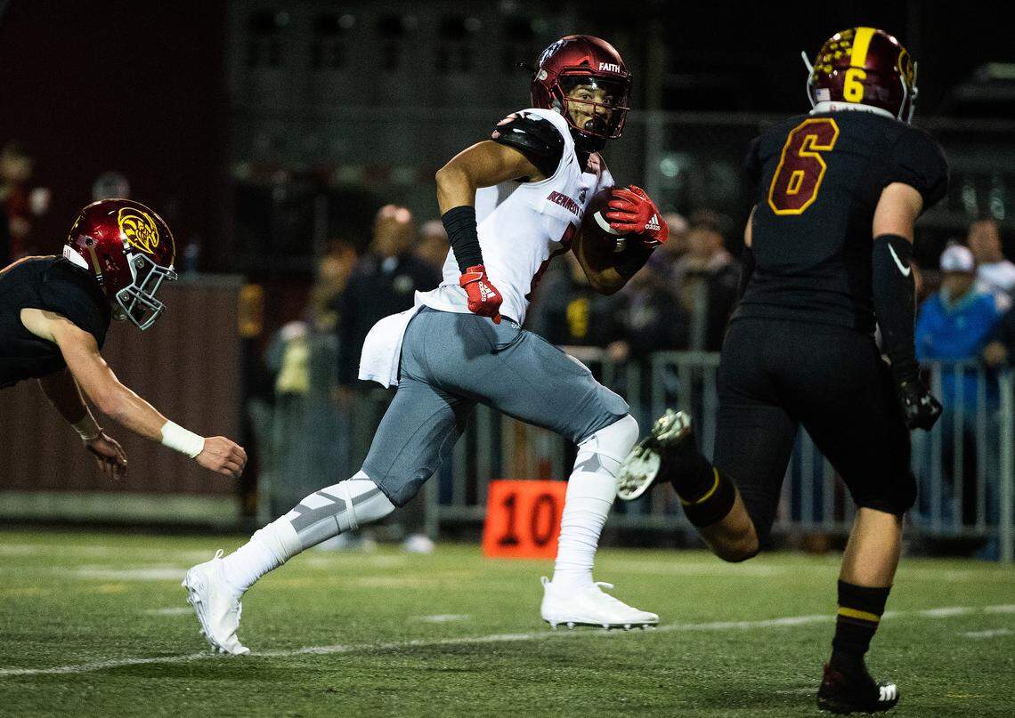 Kennedy Catholic’s Junior Alexander runs after a catch for a touchdown in the second quarter. Kennedy Catholic played Enumclaw in a football game at the Enumclaw Expo Center in Enumclaw, Wash., on Friday, Oct. 4, 2019.