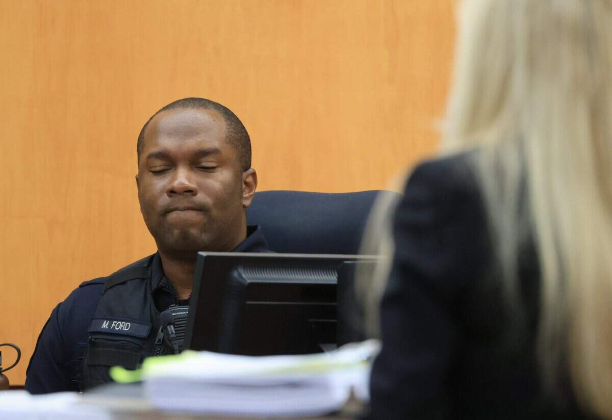 Defense attorney Anne Bremner, right, attorney for Timothy Rankine, asks questions of Tacoma Police Officer Masyih Ford in Pierce County Superior Court Wednesday Nov. 15, 2023, in Tacoma, WA. Officers Christopher Burbank, Matthew Collins and Timothy Rankine are charged with the death of Manny Ellis. Ford was RankineÕs partner at the time of his killing. (Ellen M. Banner / Pool / The Seattle Times)